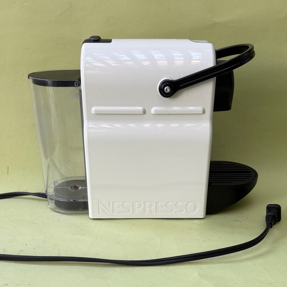Nespresso White and Black Coffee Maker